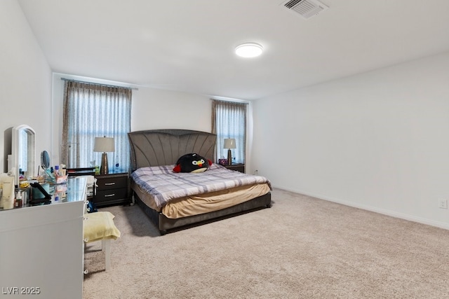 bedroom featuring carpet