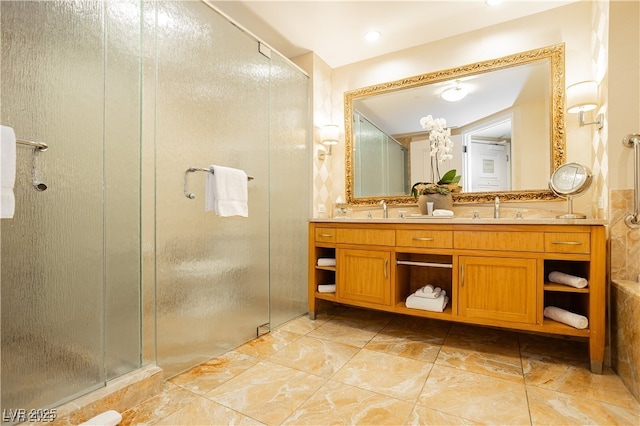 bathroom featuring vanity and an enclosed shower