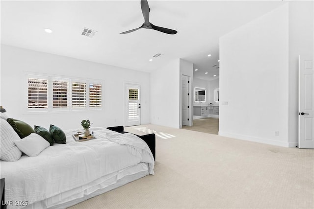 carpeted bedroom with connected bathroom and ceiling fan