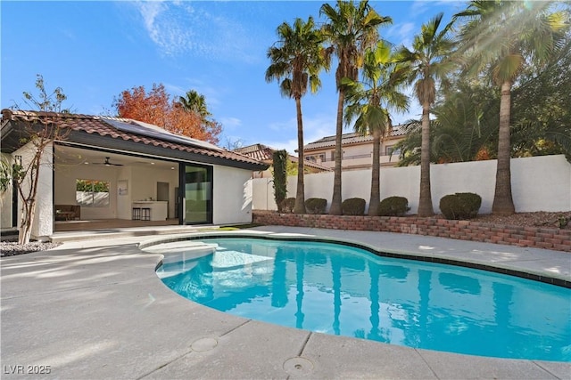 view of pool featuring a patio