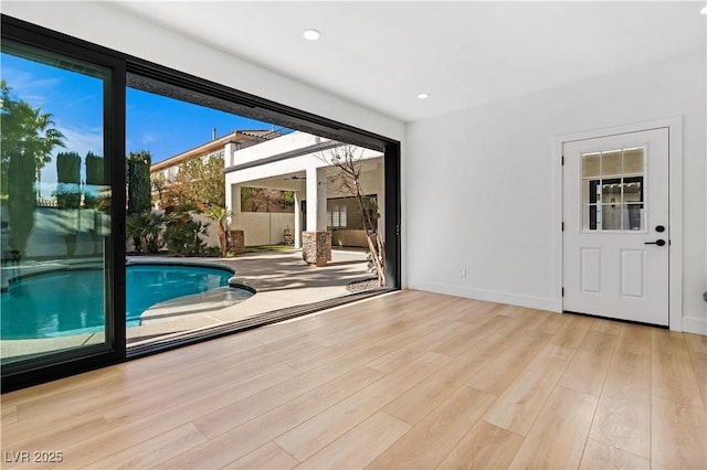 doorway featuring light wood-type flooring