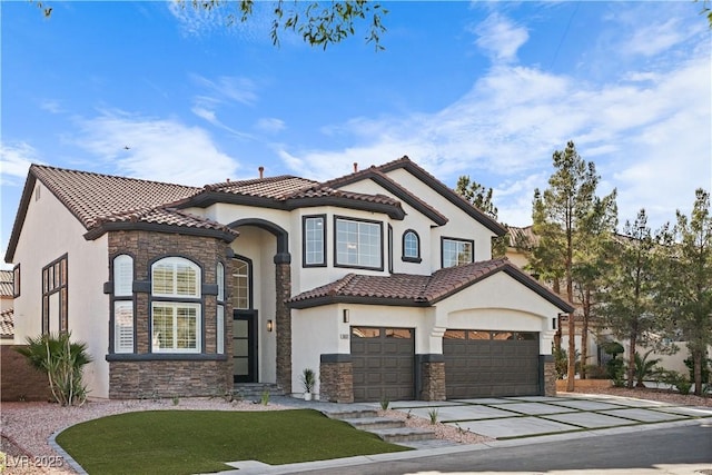 mediterranean / spanish-style house featuring a garage