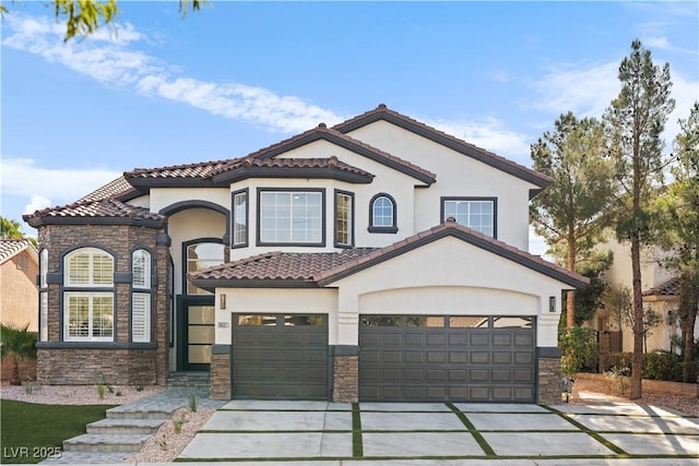 mediterranean / spanish house featuring a garage