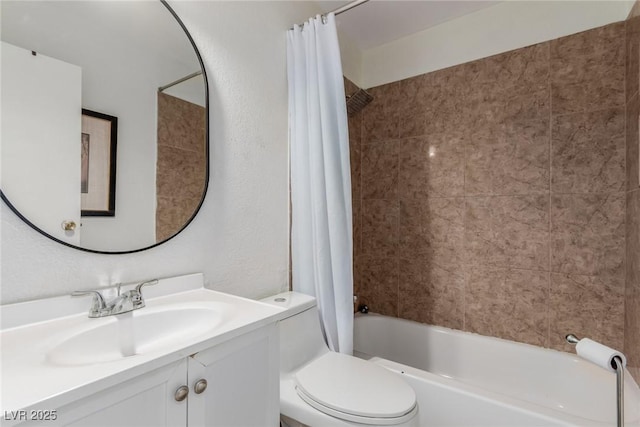 full bathroom featuring vanity, toilet, and shower / tub combo