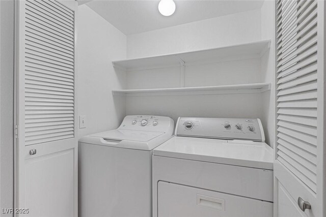 laundry room with washer and dryer