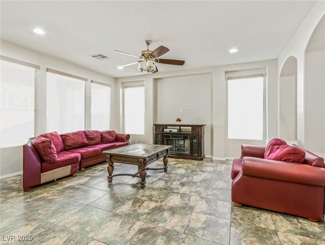 living room featuring ceiling fan