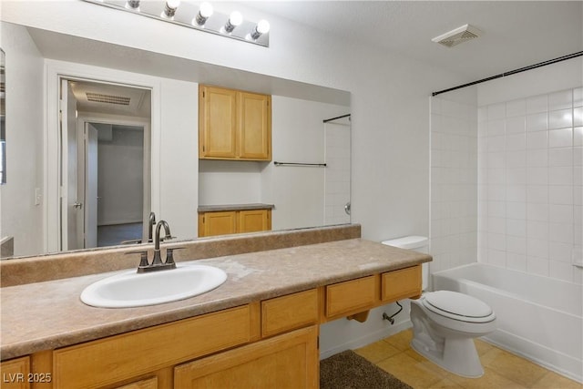full bathroom featuring visible vents, tile patterned flooring, vanity, toilet, and bathing tub / shower combination