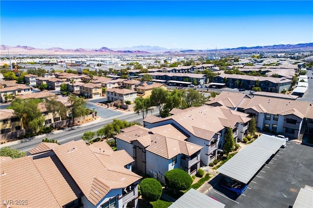 birds eye view of property featuring a residential view and a mountain view
