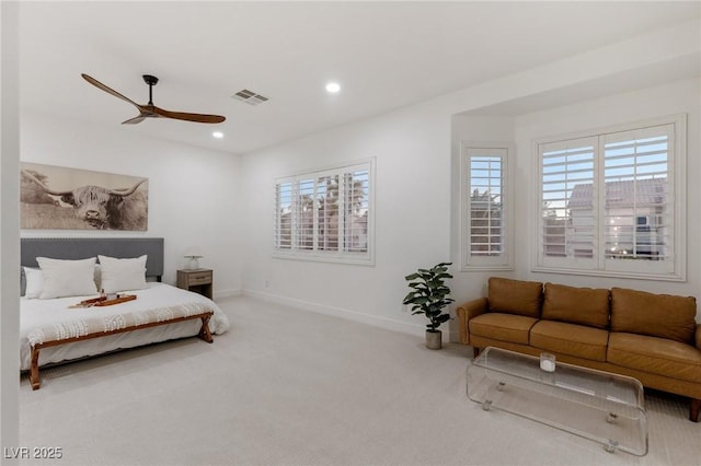 carpeted bedroom with ceiling fan