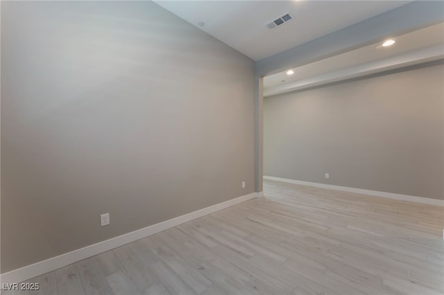 unfurnished room featuring light hardwood / wood-style floors