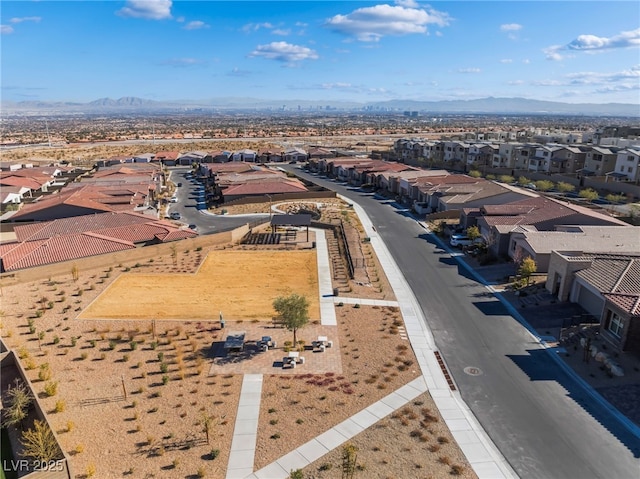 drone / aerial view featuring a mountain view