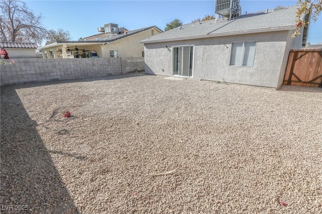 back of house featuring cooling unit and a patio area