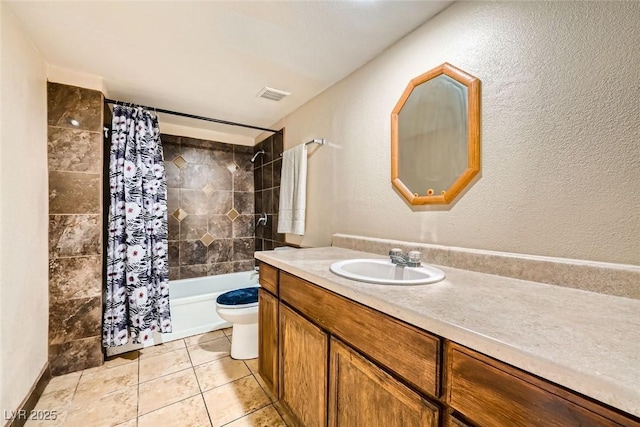 full bathroom with toilet, vanity, tile patterned flooring, and shower / bath combo with shower curtain