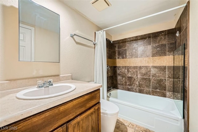 full bathroom featuring toilet, vanity, and shower / bath combo with shower curtain