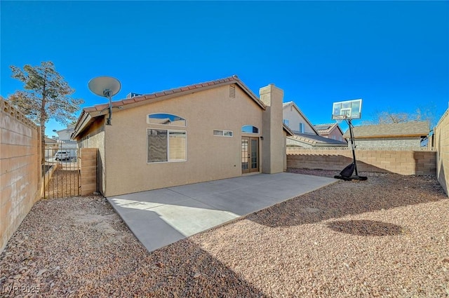 rear view of house with a patio area