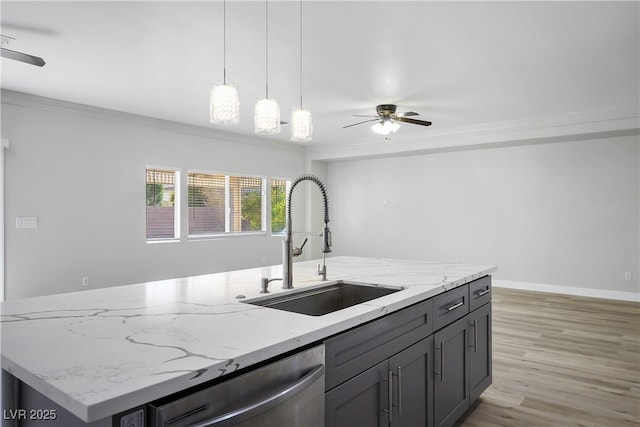 kitchen featuring light stone counters, ceiling fan, sink, a center island with sink, and dishwasher