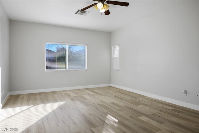 unfurnished room featuring ceiling fan and light hardwood / wood-style floors