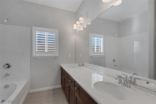 bathroom with tile patterned floors and vanity