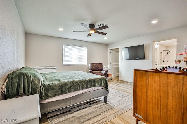 bedroom featuring ceiling fan and light hardwood / wood-style flooring