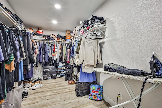 walk in closet featuring wood-type flooring