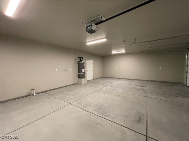 garage with water heater and a garage door opener