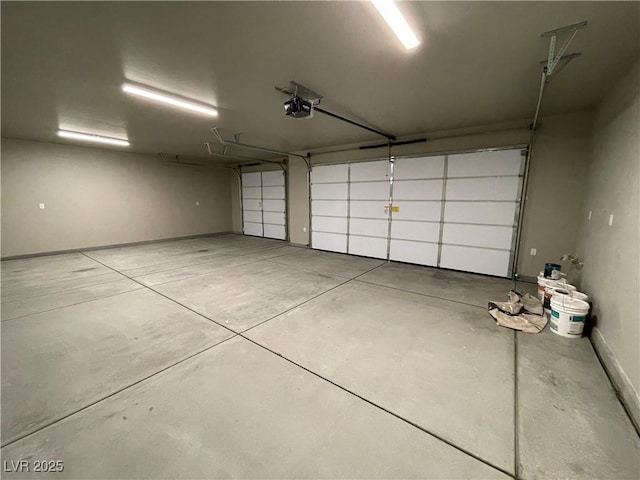 garage featuring a garage door opener