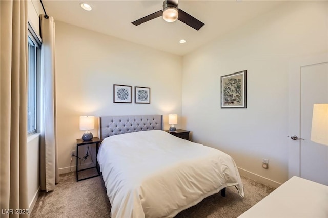 carpeted bedroom with ceiling fan