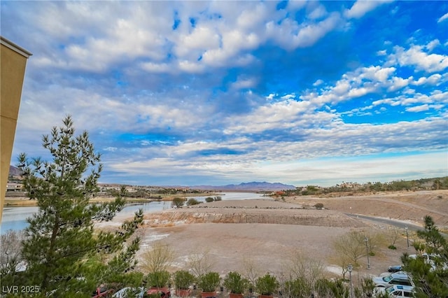 exterior space featuring a water and mountain view