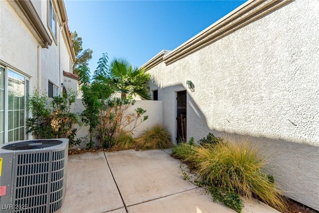 view of patio featuring cooling unit