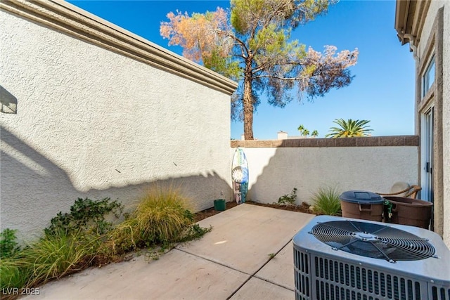 view of patio featuring central AC unit