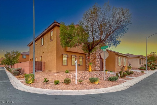 view of property exterior at dusk