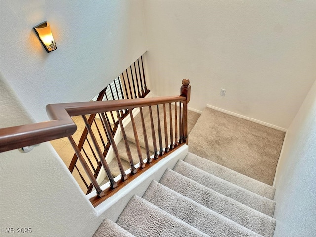 stairway with carpet floors