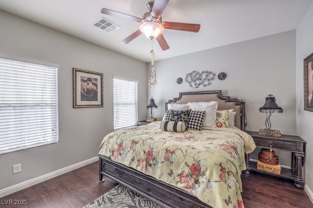 bedroom featuring dark hardwood / wood-style floors and ceiling fan