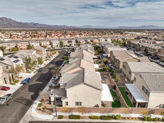 bird's eye view with a mountain view