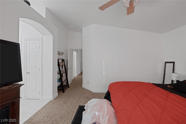 bedroom with light carpet and ceiling fan