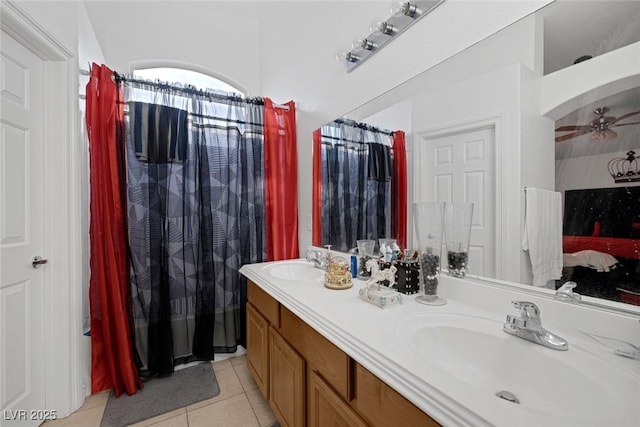 bathroom featuring tile patterned flooring, vanity, and ceiling fan