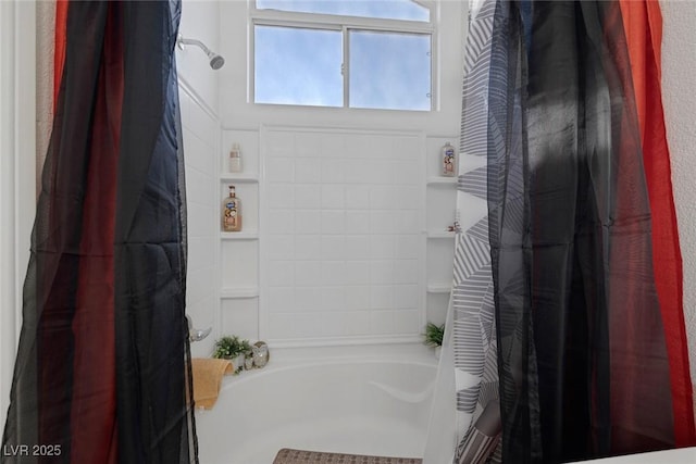 bathroom with shower / bathtub combination with curtain