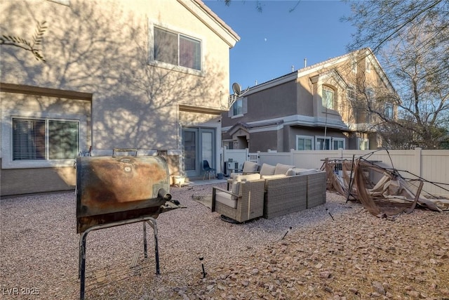 back of house with an outdoor hangout area and a patio area