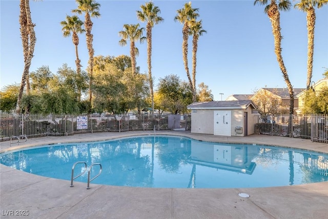 view of swimming pool featuring a patio area