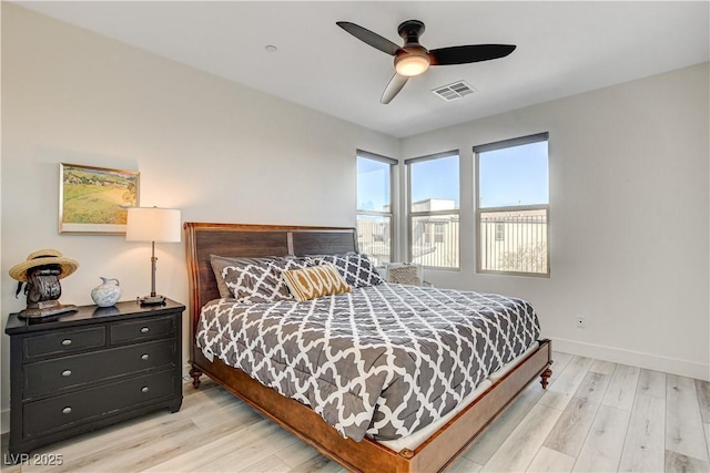 bedroom featuring ceiling fan and light hardwood / wood-style flooring