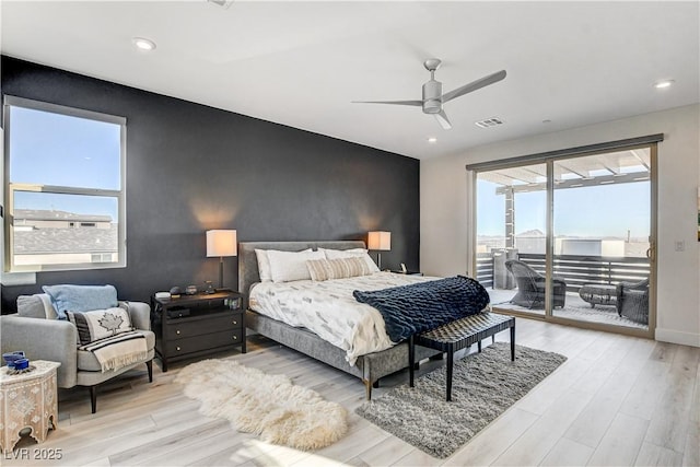 bedroom featuring ceiling fan, access to exterior, and light hardwood / wood-style flooring