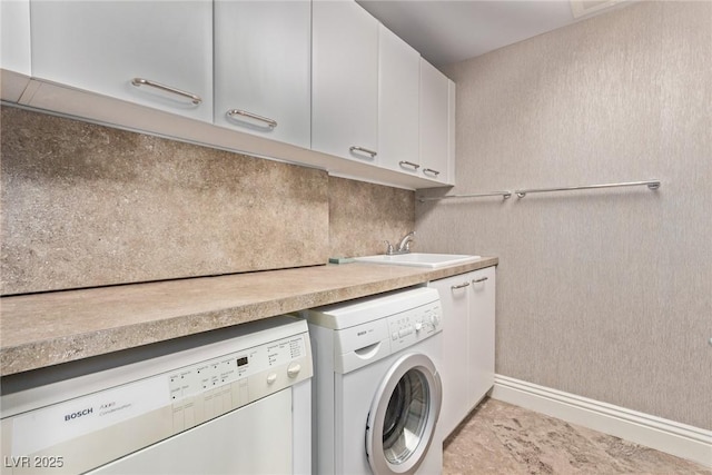 clothes washing area with cabinets, sink, and a mail area