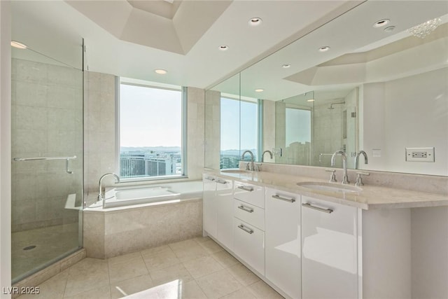 bathroom with vanity, tile patterned floors, and independent shower and bath