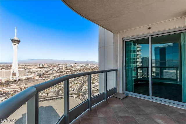 balcony featuring a mountain view