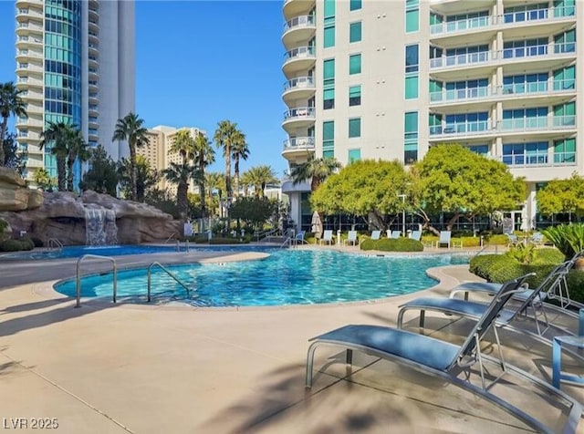 view of swimming pool with a patio