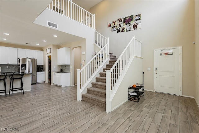 entrance foyer featuring a high ceiling