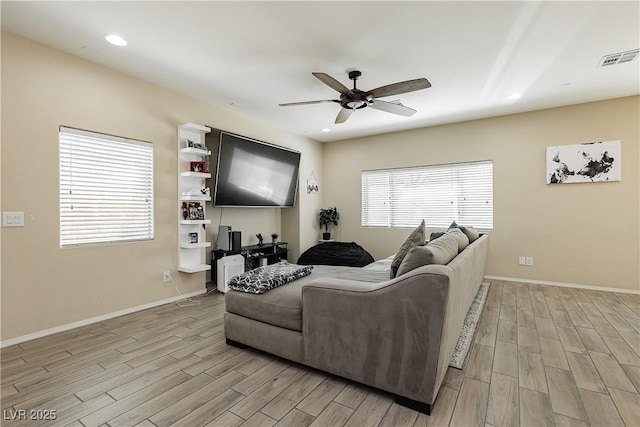 living room with ceiling fan