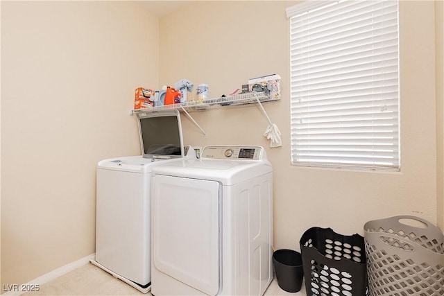 washroom with washer and clothes dryer