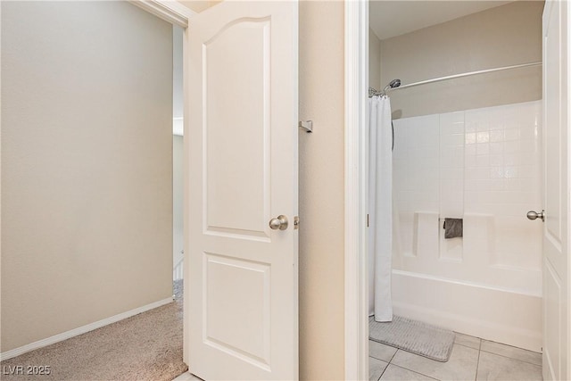 bathroom featuring tile patterned flooring and shower / bath combination with curtain