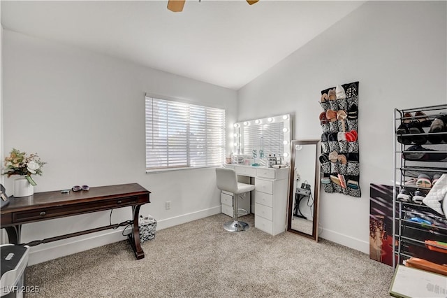 carpeted home office featuring ceiling fan and lofted ceiling